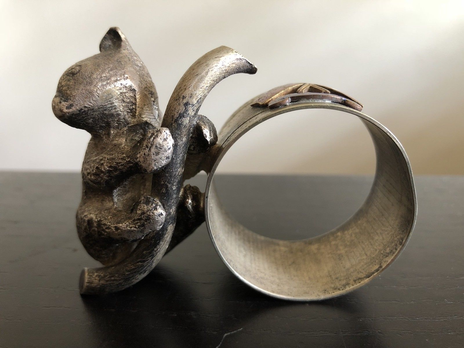 Koala figural napkin ring. Marked Angus Cootes. Australian