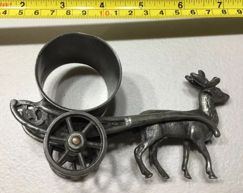 deer pulling cart with wheels. FAKE. Marked Rogers & Bro 151 (This number corresponds to a peacock FNR by Meriden)