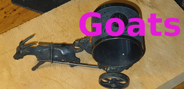 Goat figural napkin rings