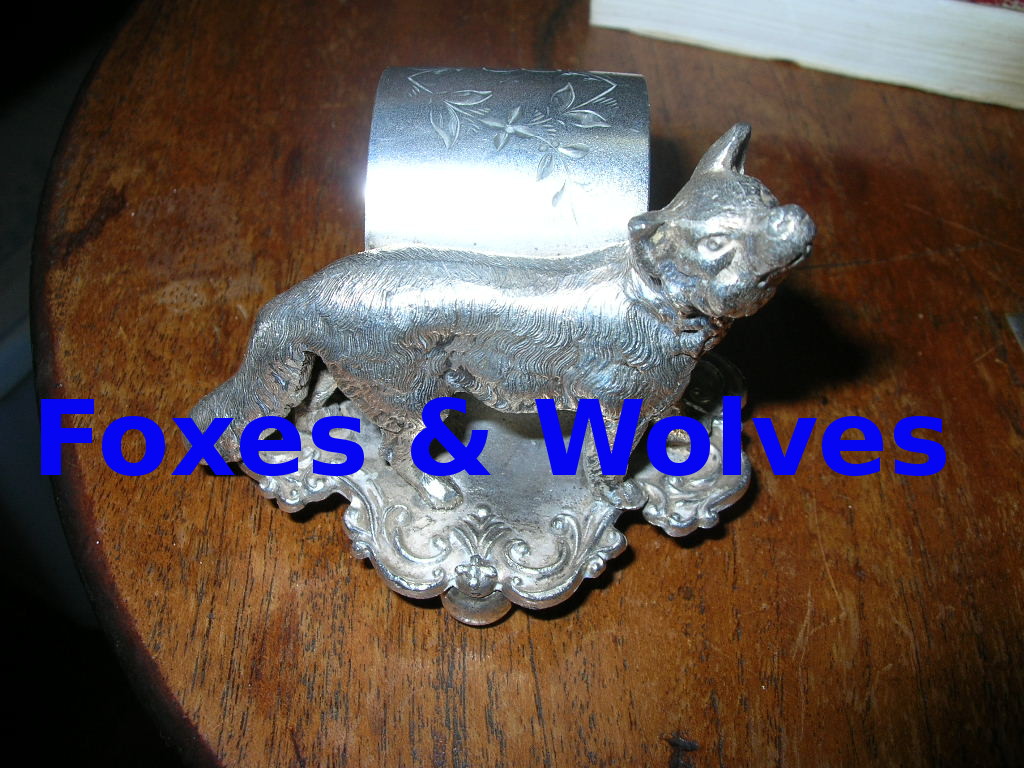 Fox and wolf figural napkin rings