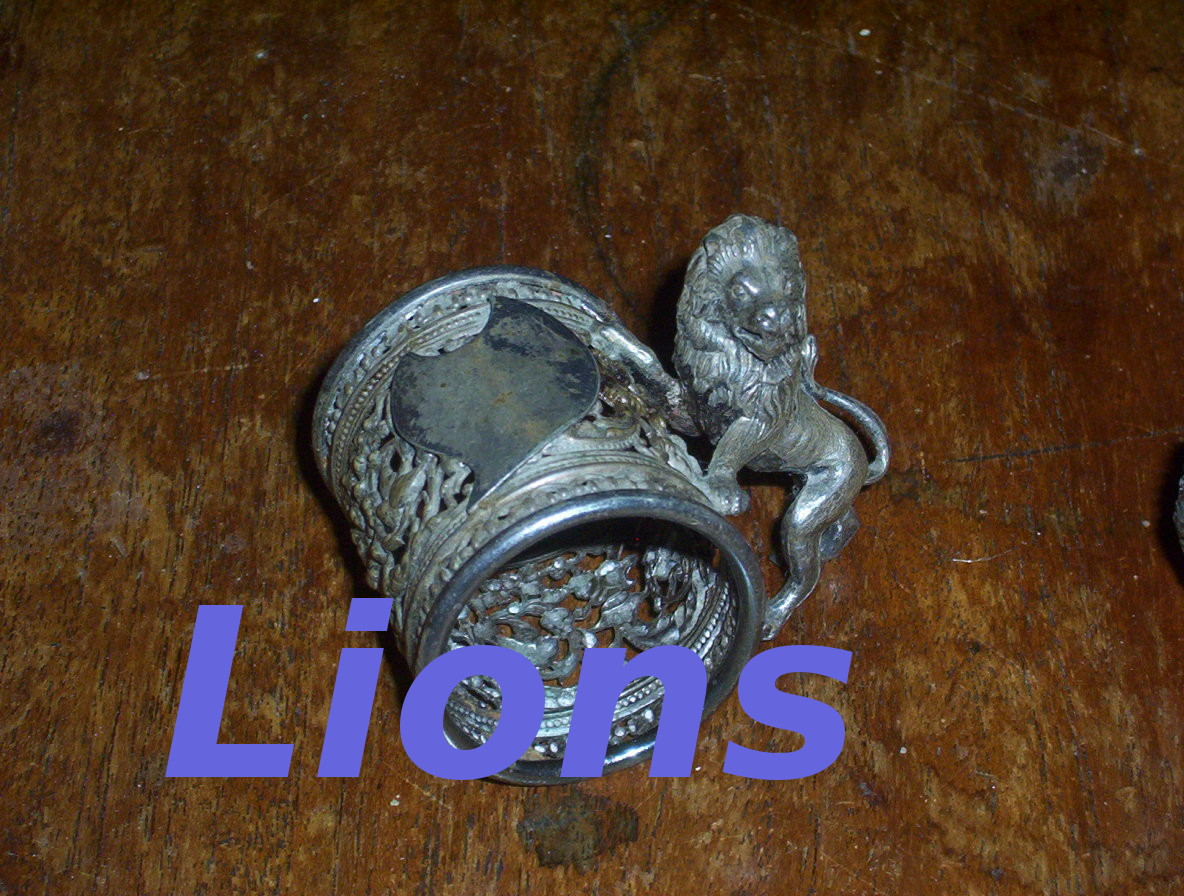 Lion figural napkin rings